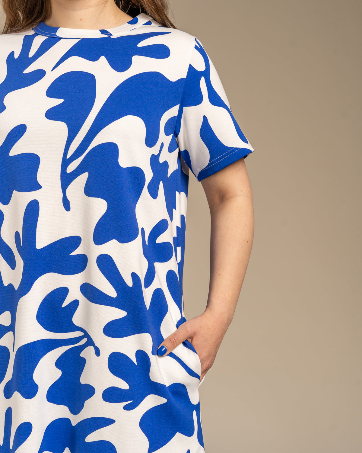 Poimuhelmainen Mekko, Como